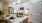 a kitchen with a white countertop