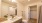 a bathroom with a large mirror